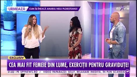 Face sport zi de zi și stă în mâini însărcinată în nouă luni