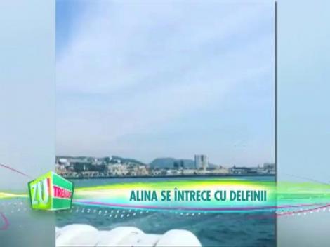 Alina Eremia se întrece cu delfinii